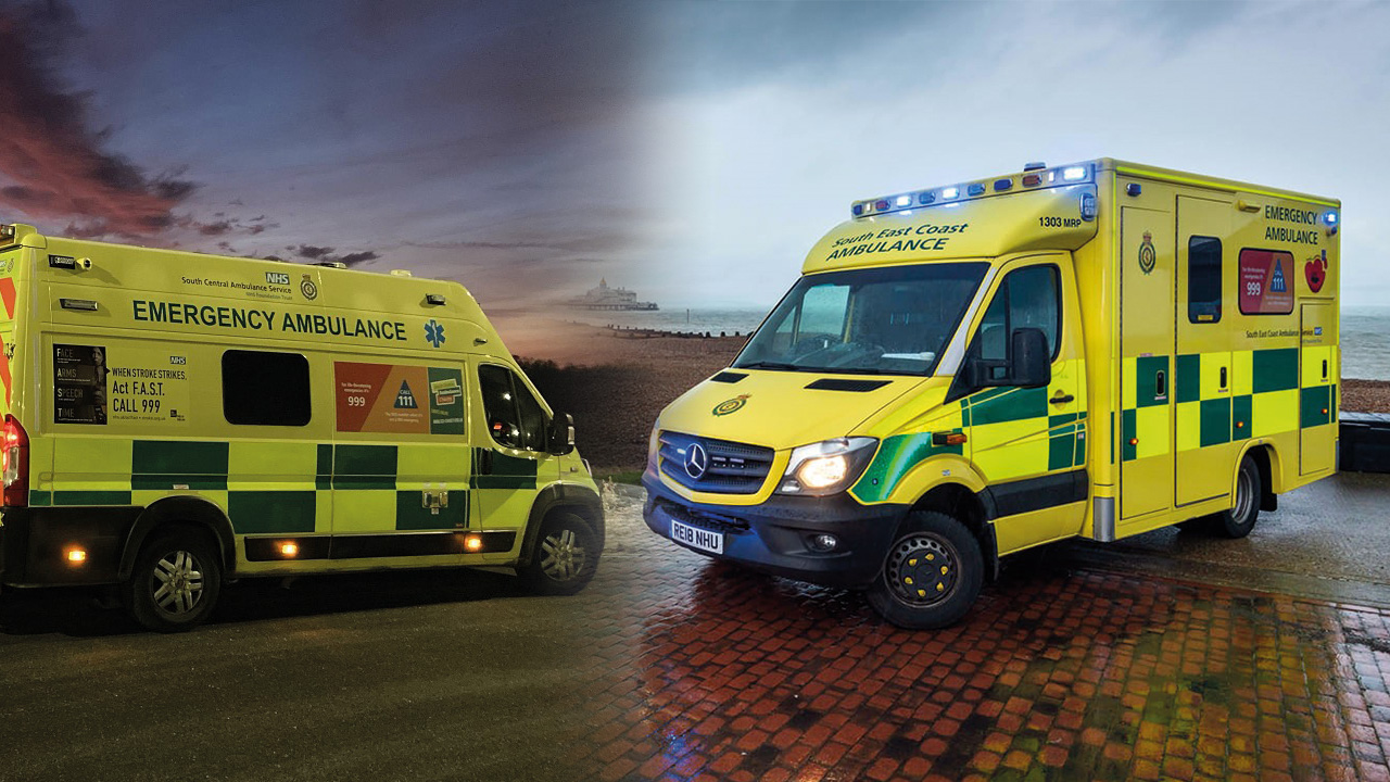 Two yellow ambulances side by side
